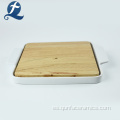 Placa de cena de cerámica blanca multifuncional al por mayor del rectángulo con el tablero de madera